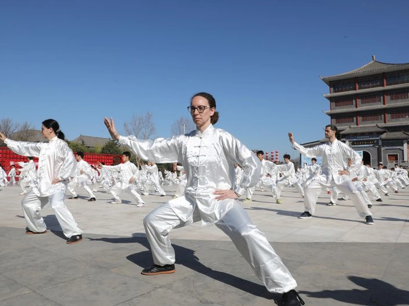 Tai Chi practitioners performing traditional movements in Chenjiagou village